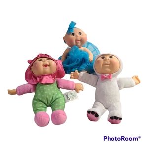 Cabbage Patch Kids Dolls. Dolls are in good used condition. Mark on one's face. 